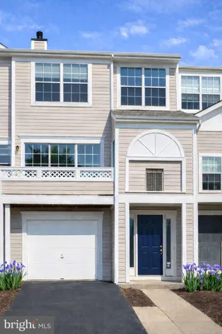 a view of building with large windows