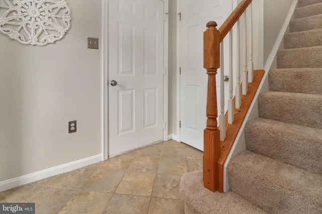 a view of an entryway with staircase