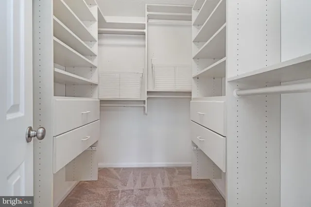 a view of a white building among the street