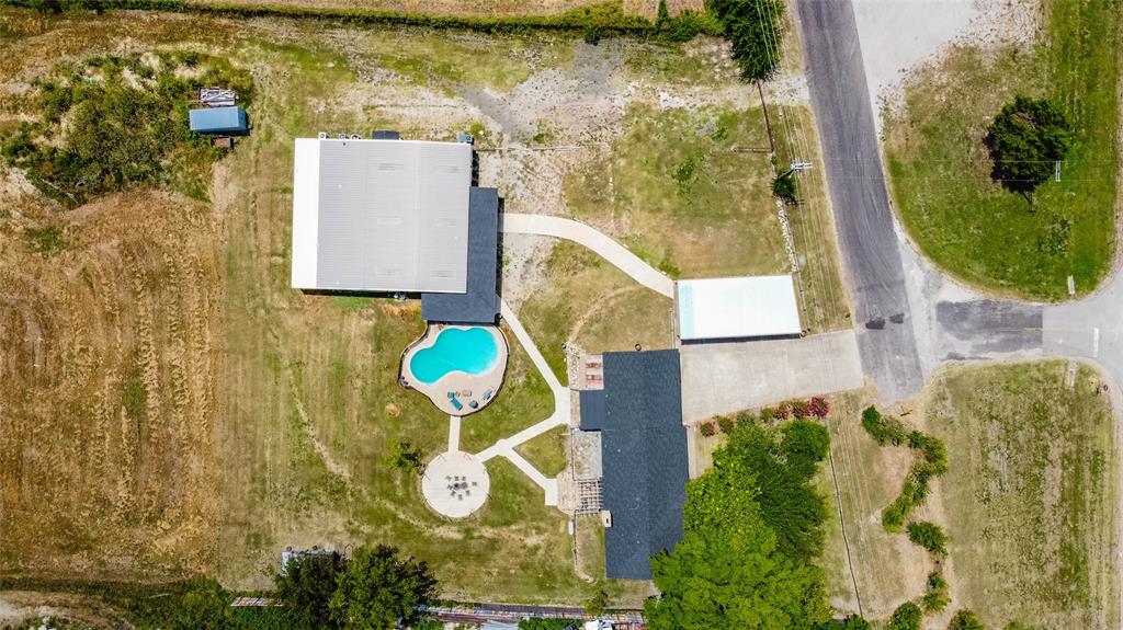 8204 County Road 1061 Blue Ridge, TX 75424 - Photo 4 of 33 an aerial view of a residential houses with outdoor space