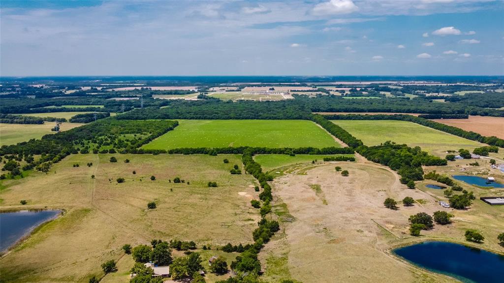 8204 County Road 1061 Blue Ridge, TX 75424 - Photo 6 of 33 a view of a swimming pool and an ocean view