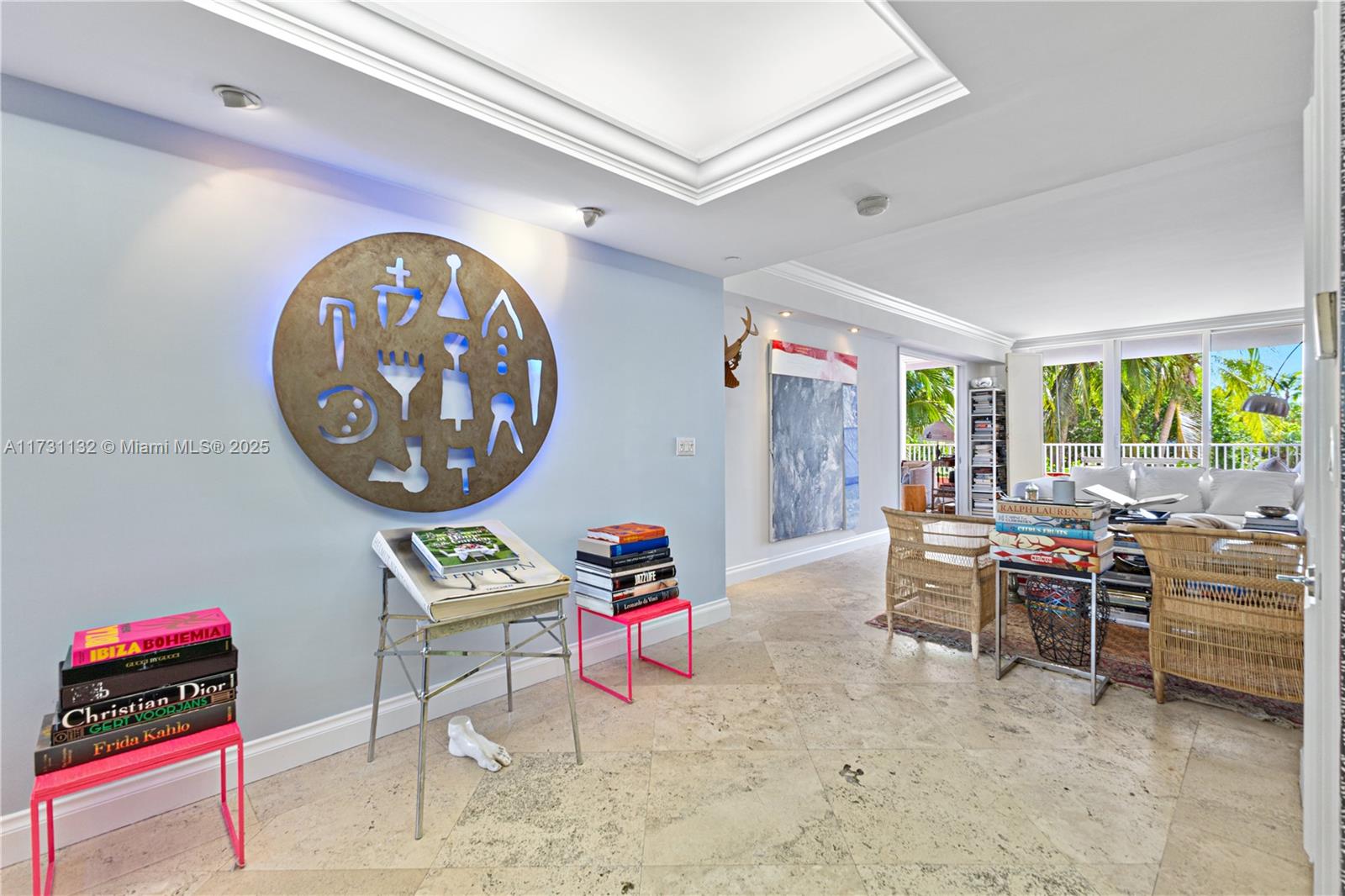 781 Crandon Boulevard, Unit 406 Key Biscayne, FL 33149 - Photo 27 of 35 a living room with furniture and a large window
