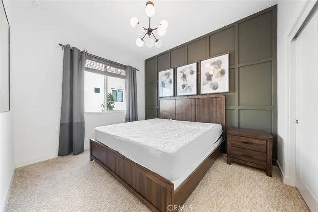 a view of a hallway with washer and dryer