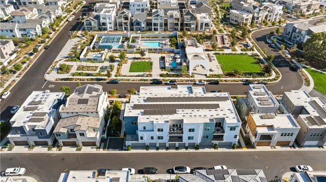 a view of a patio with a table and chairs