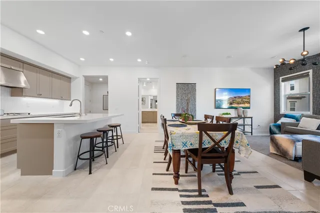 a kitchen with appliances cabinets and a sink