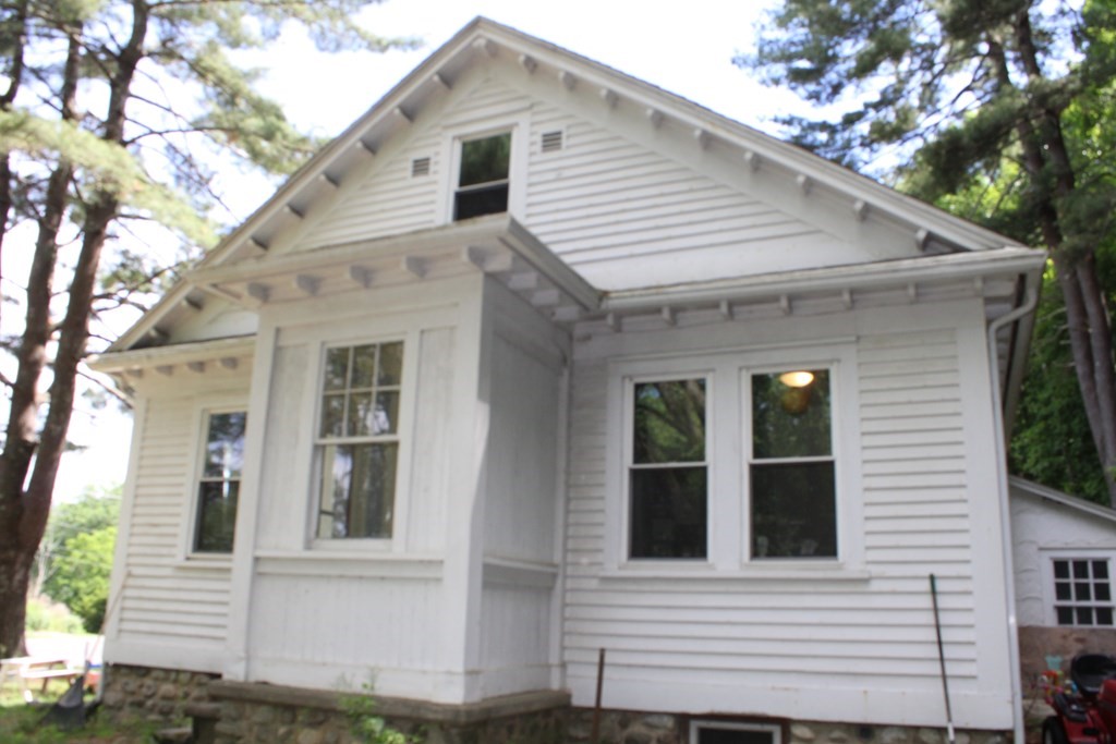321 Easthampton Road Northampton, MA 01062 - Photo 2 of 15 a view of a white house with a large windows