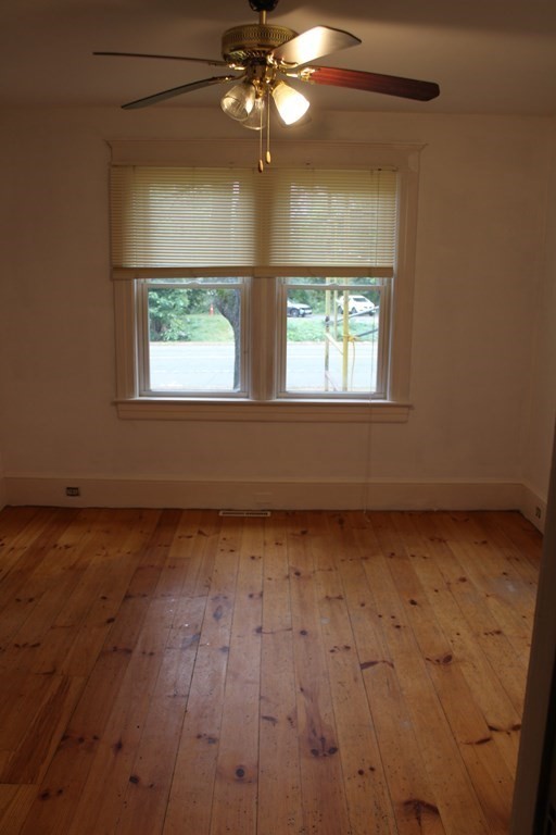 321 Easthampton Road Northampton, MA 01062 - Photo 9 of 15 a view of an empty room with a window