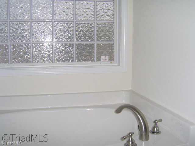 190 Everidge Road Winston-Salem, NC 27103 - Photo 7 of 9 Other. Master Suite/Bath features Garden Tub w/Glass Block Wall, Separate Shower, Double Vanity w/Marble and Large Walk in Closet
