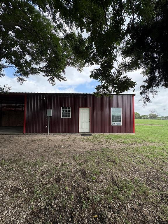 Tbd Palmyra Road Palmer, TX 75152 - Photo 19 of 31 a view of a backyard with large trees and wooden fence