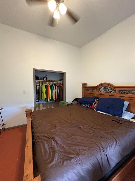 Tbd Palmyra Road Palmer, TX 75152 - Photo 24 of 31 a bedroom with a bed and a chandelier