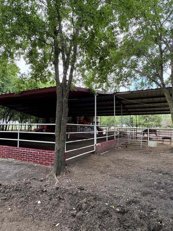 Tbd Palmyra Road Palmer, TX 75152 - Photo 30 of 31 a view of outdoor space with deck and white umbrellas
