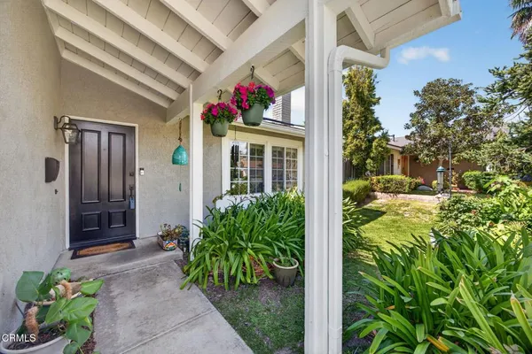a front view of a house with a porch