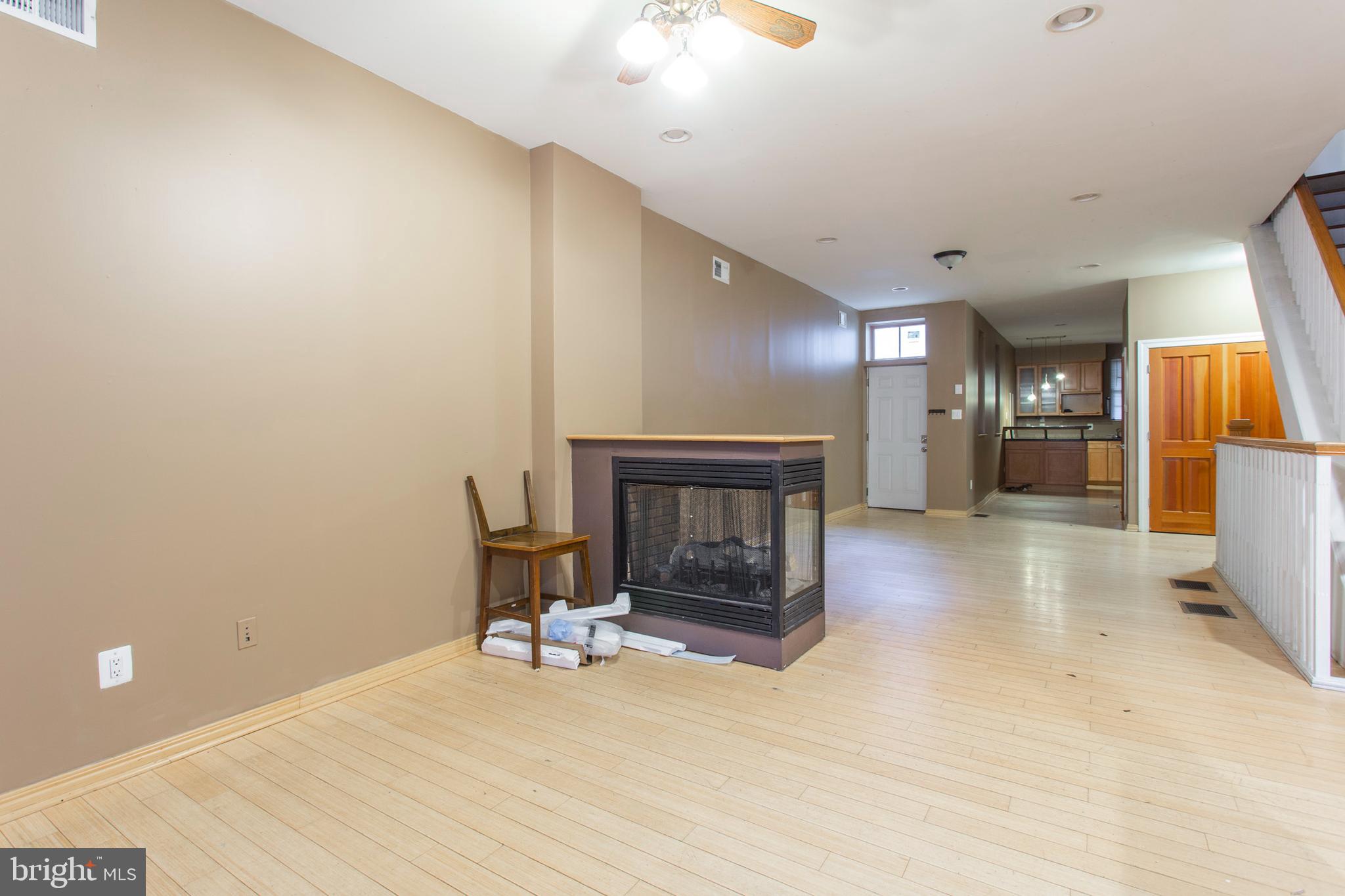 4436 Sansom Street Philadelphia, PA 19104 - Photo 5 of 31 a view of a livingroom with a fireplace
