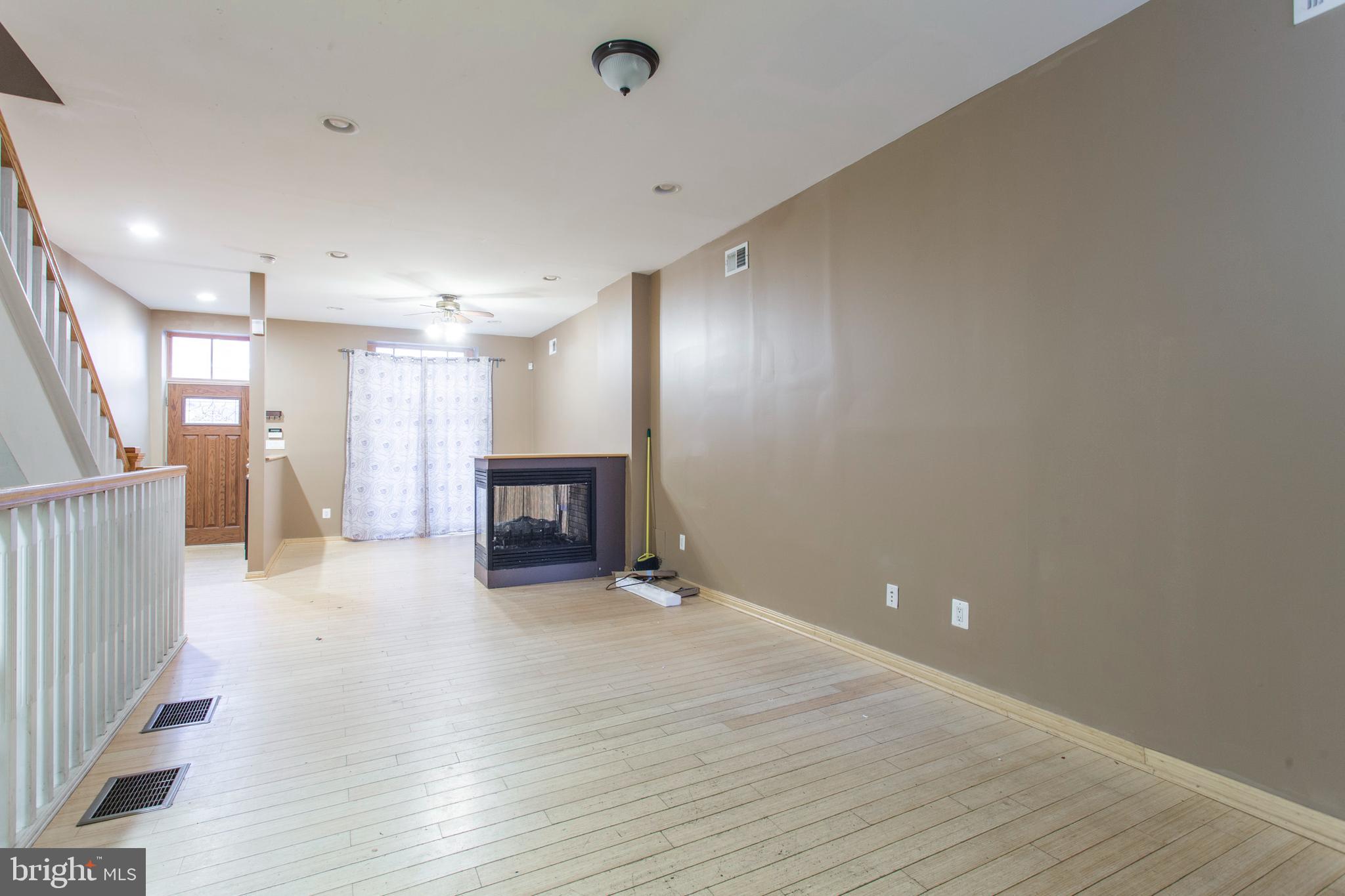 4436 Sansom Street Philadelphia, PA 19104 - Photo 8 of 31 a view of a hallway with wooden floor