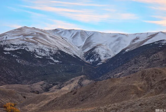 a view of a house with a mountain
