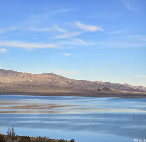 a view of ocean and a mountain