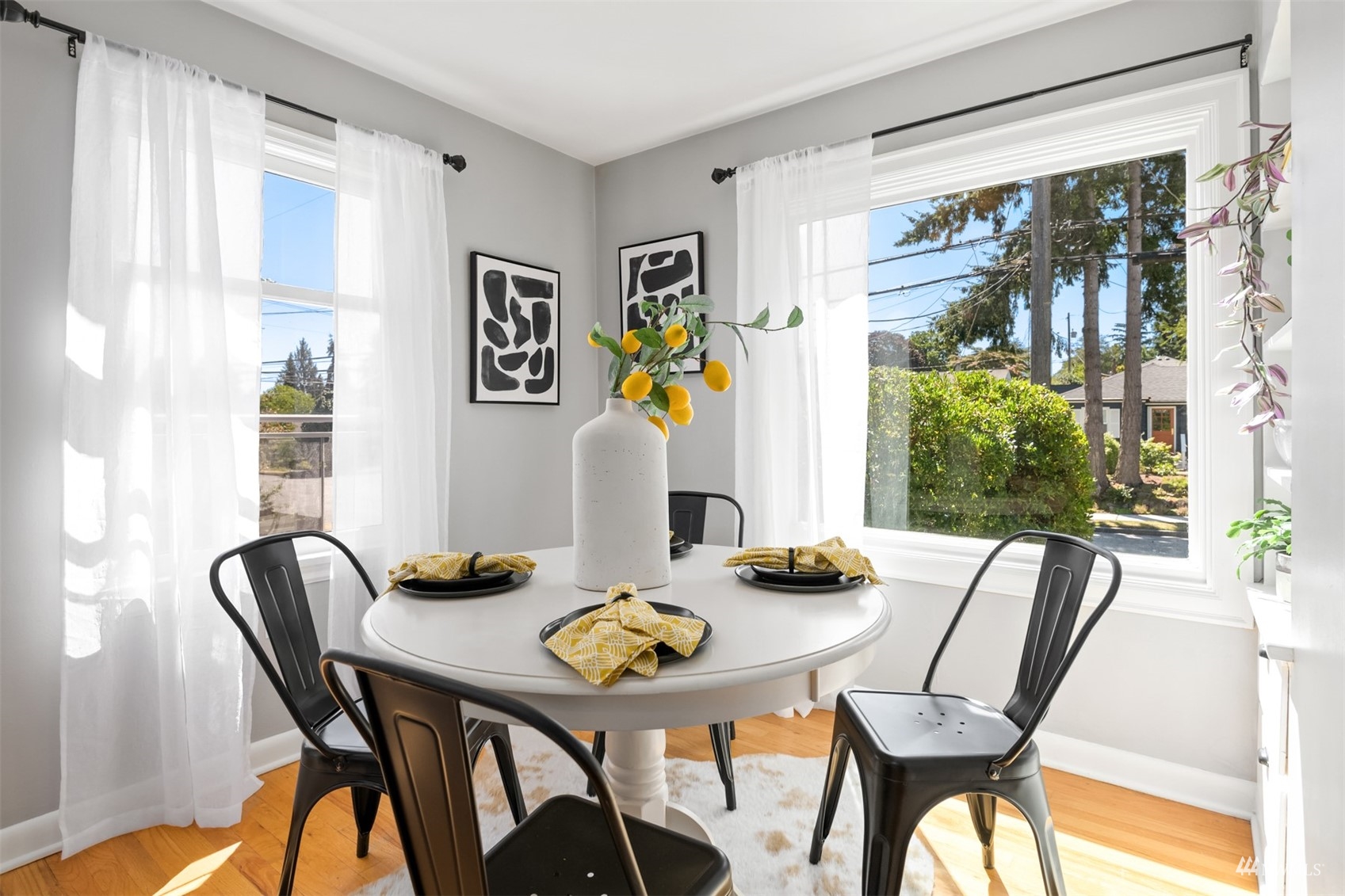 3912 Southwest Holden Street Seattle, WA 98136 - Photo 11 of 27 a view of a dining room with furniture window and outside view