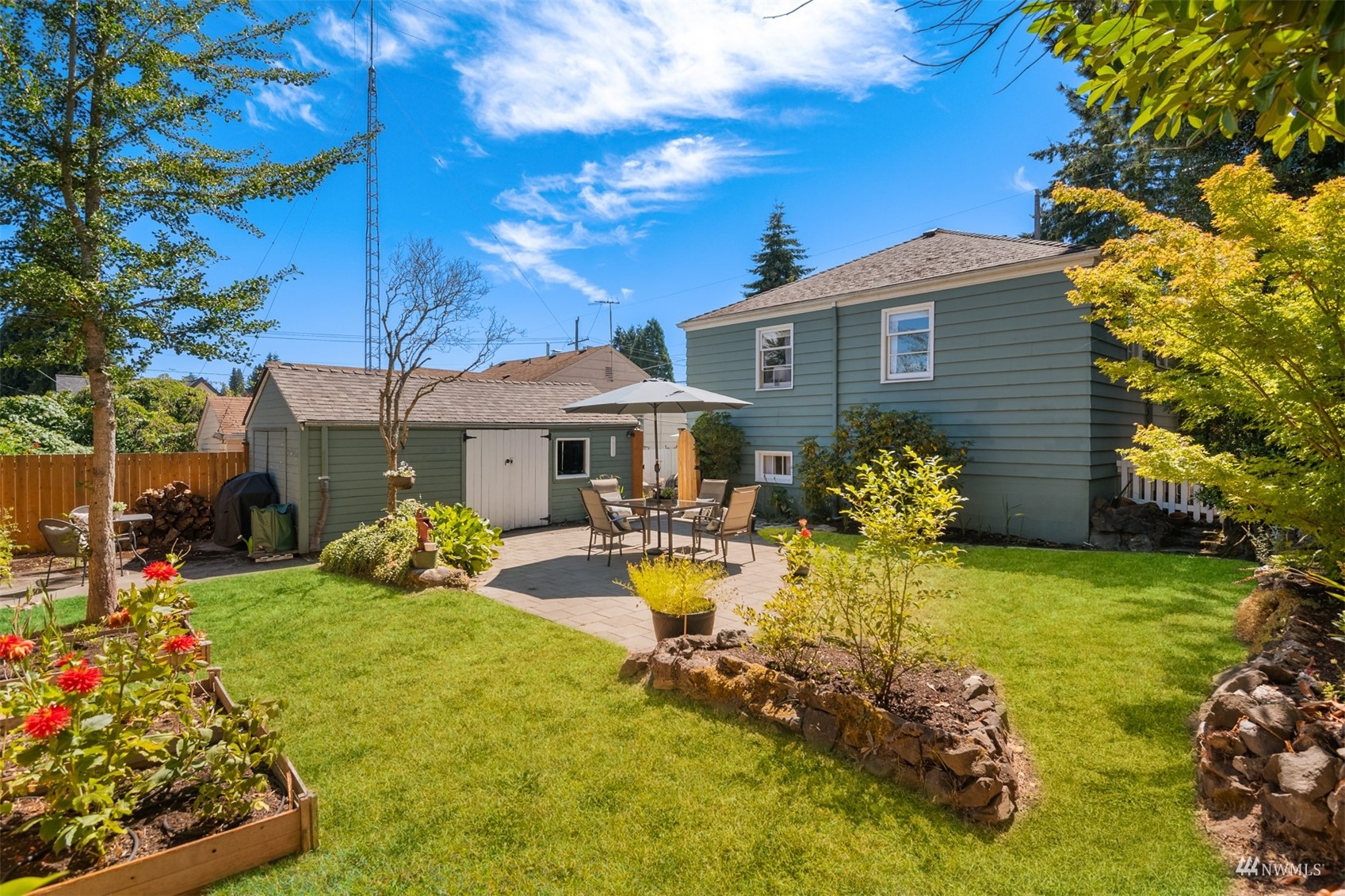 3912 Southwest Holden Street Seattle, WA 98136 - Photo 22 of 27 a view of a house with swimming pool and sitting area