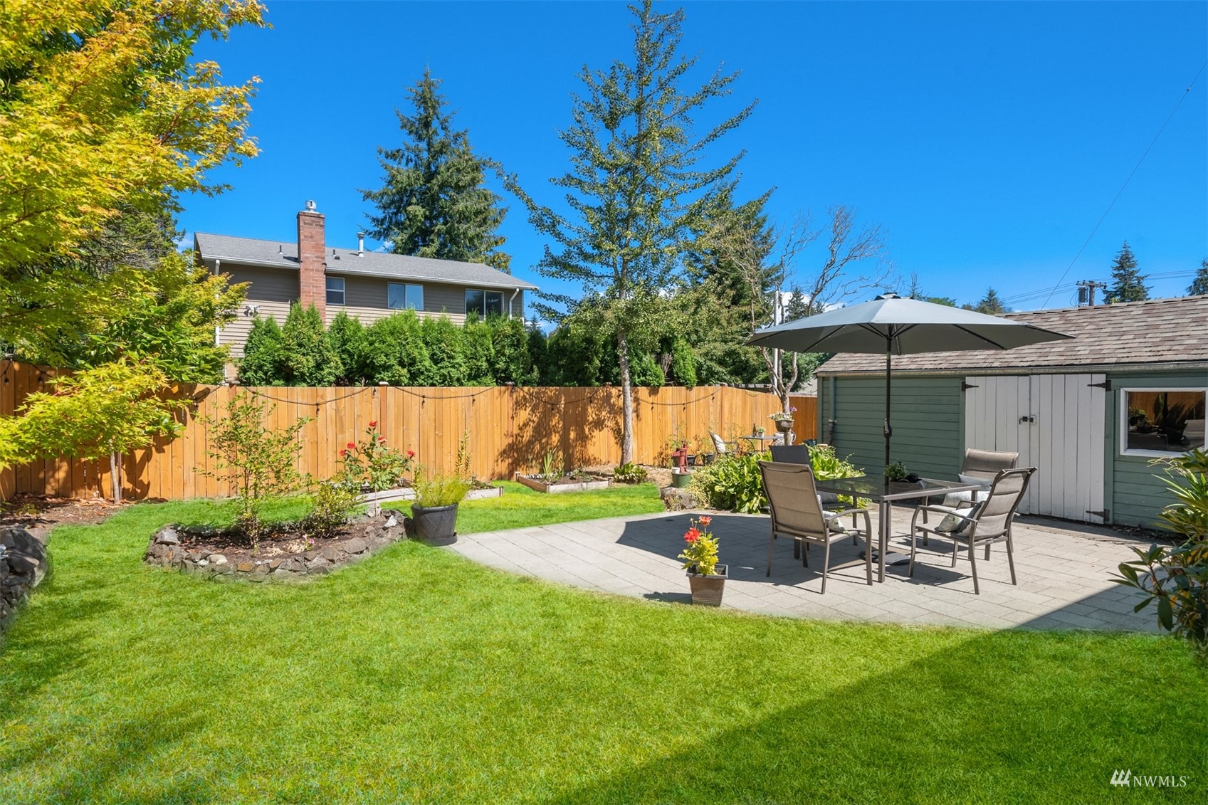 3912 Southwest Holden Street Seattle, WA 98136 - Photo 23 of 27 a garden view with a seating space
