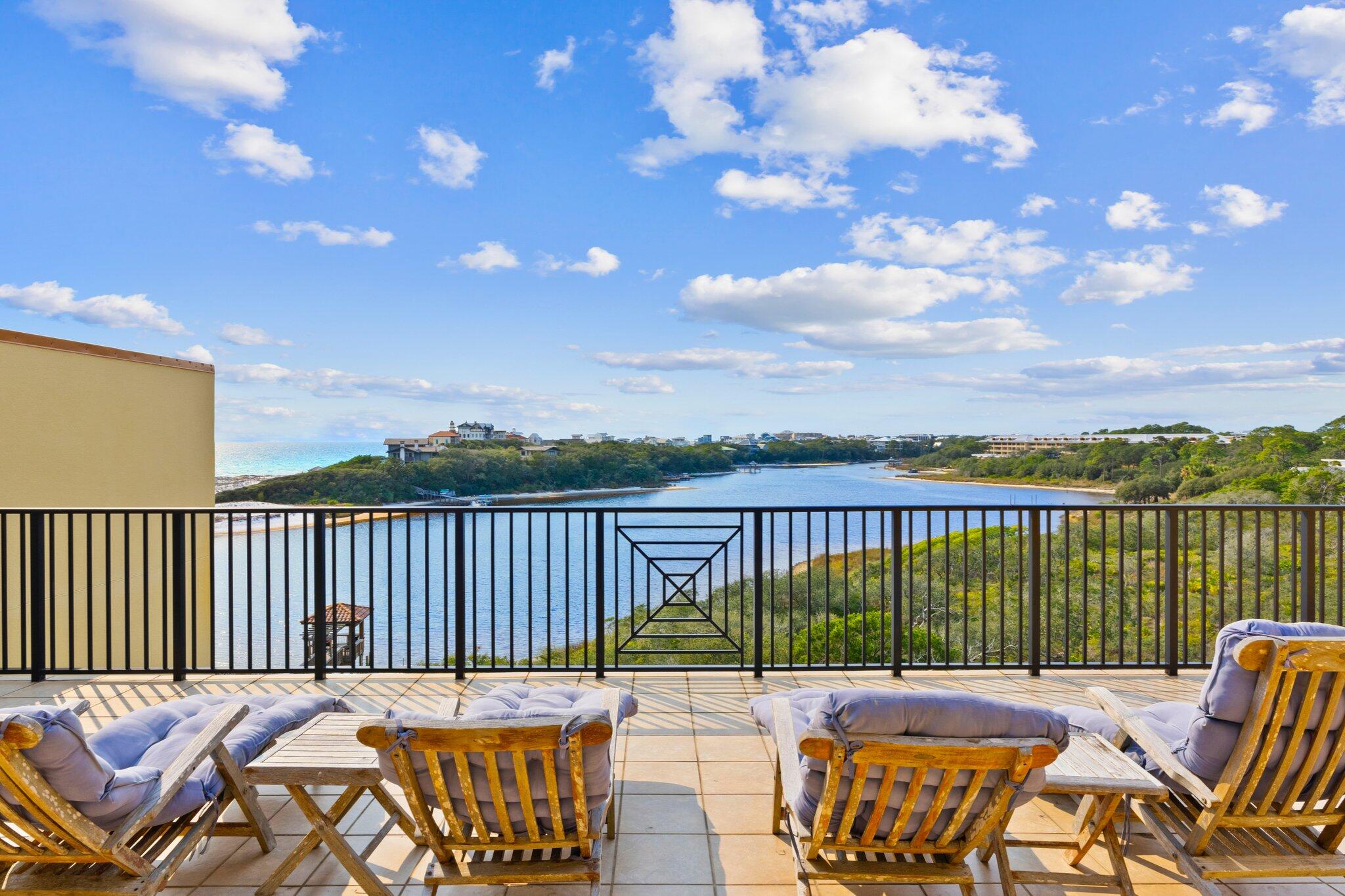a view of balcony with furniture