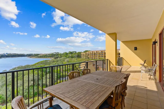 a view of a balcony with furniture
