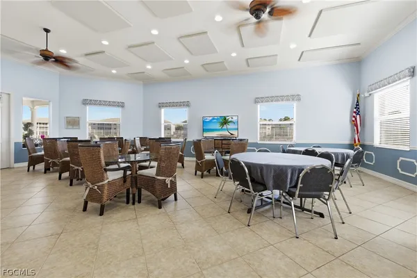a view of a dining area with furniture and window