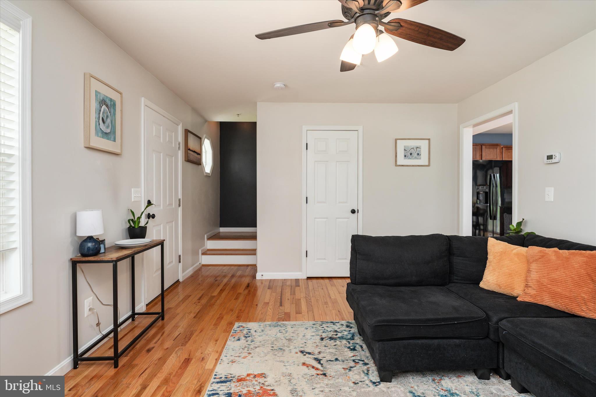 200 Newtown Road Chester, MD 21619 - Photo 12 of 50 a living room with furniture and a wooden floor