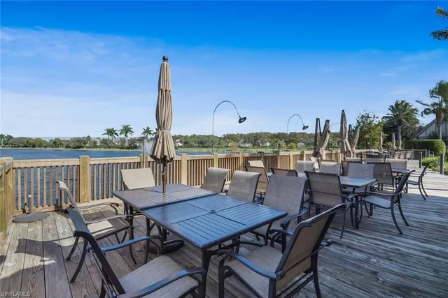 a view of a chairs and table on the deck