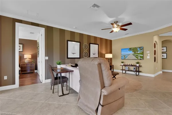 a living room with furniture and a table
