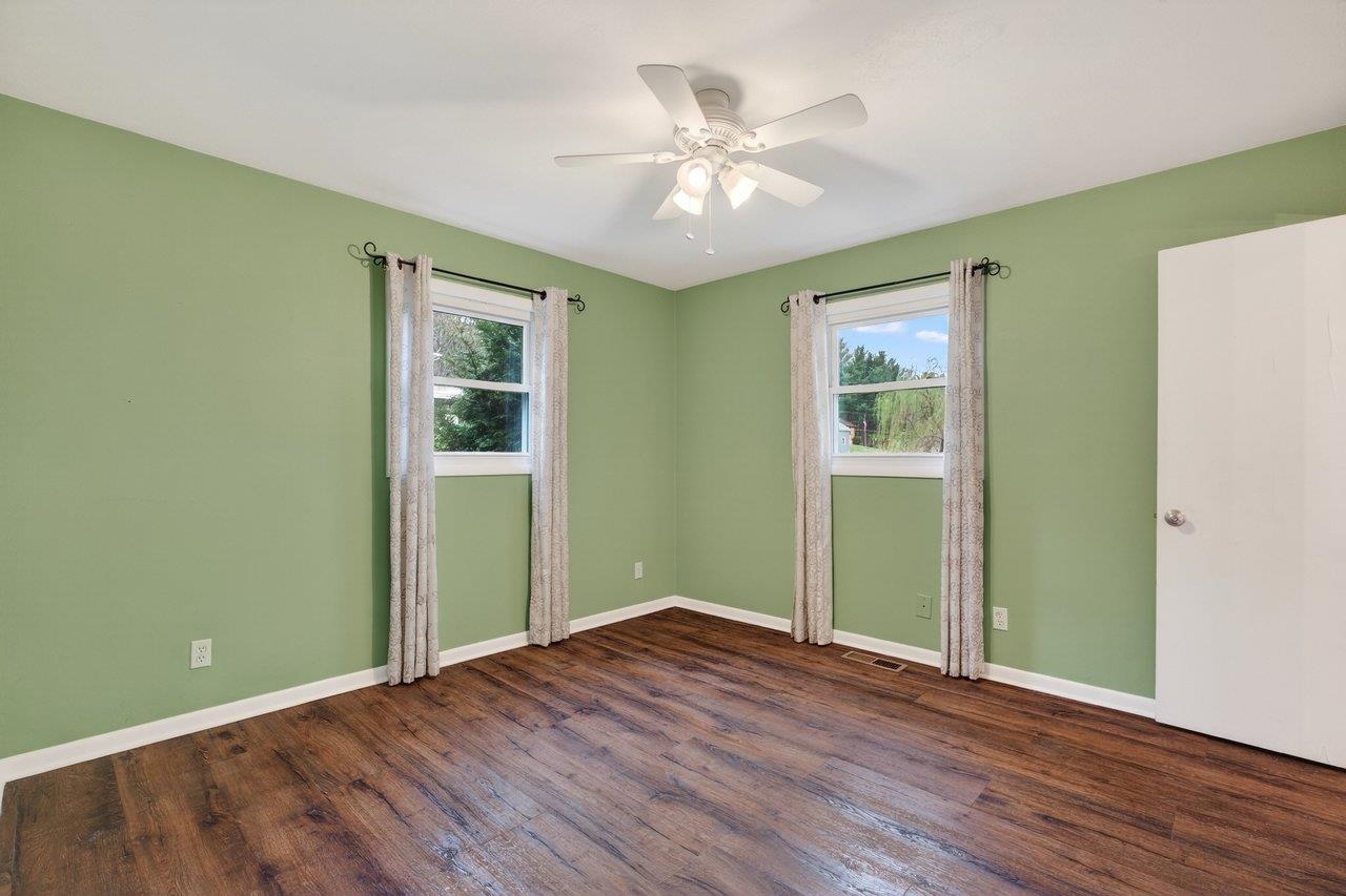3259 Zion Church Road Broadway, VA 22815 - Photo 12 of 48 wooden floor in an empty room with a window