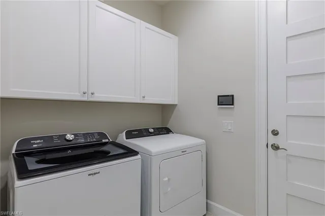 a workspace with furniture and a lamp