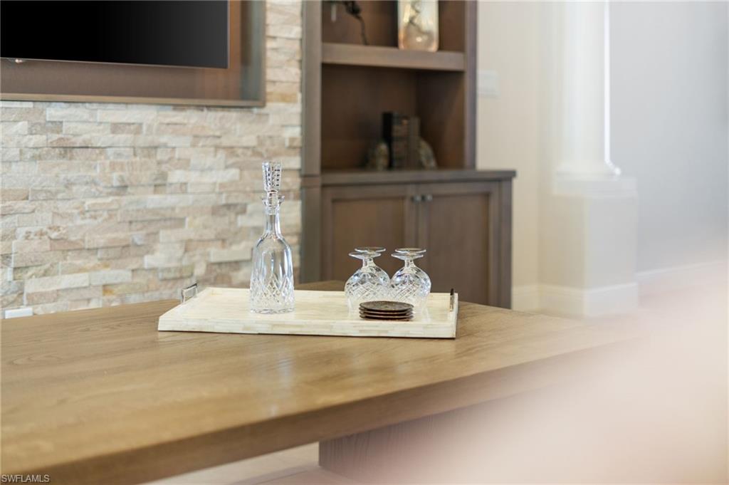 10067 Palazzo Drive Naples, FL 34119 - Photo 11 of 46 a close view of a sink with cabinets