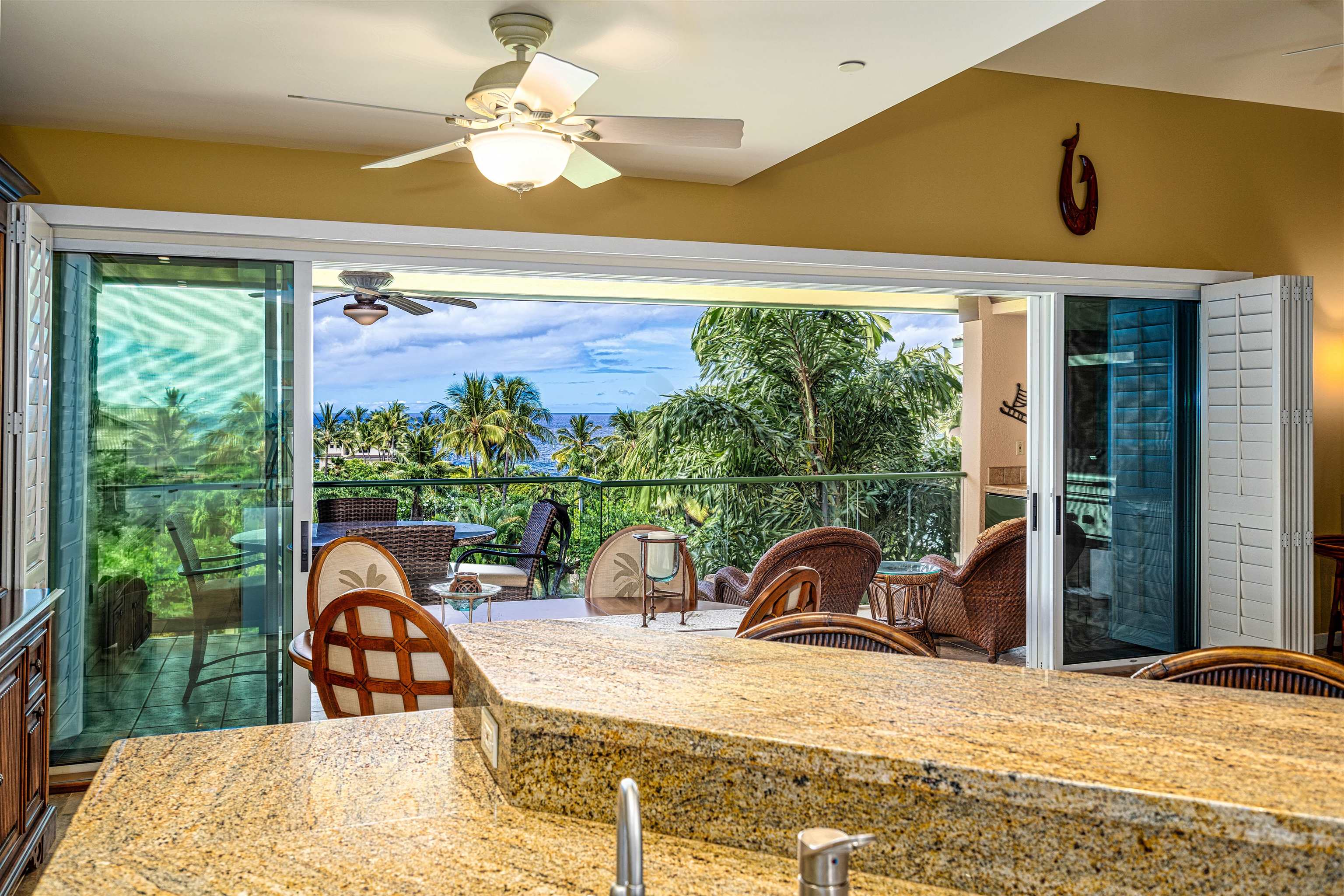 4955 Makena Road, Unit E301 Kihei, HI 96753 - Photo 12 of 22 a view of a swimming pool from a balcony