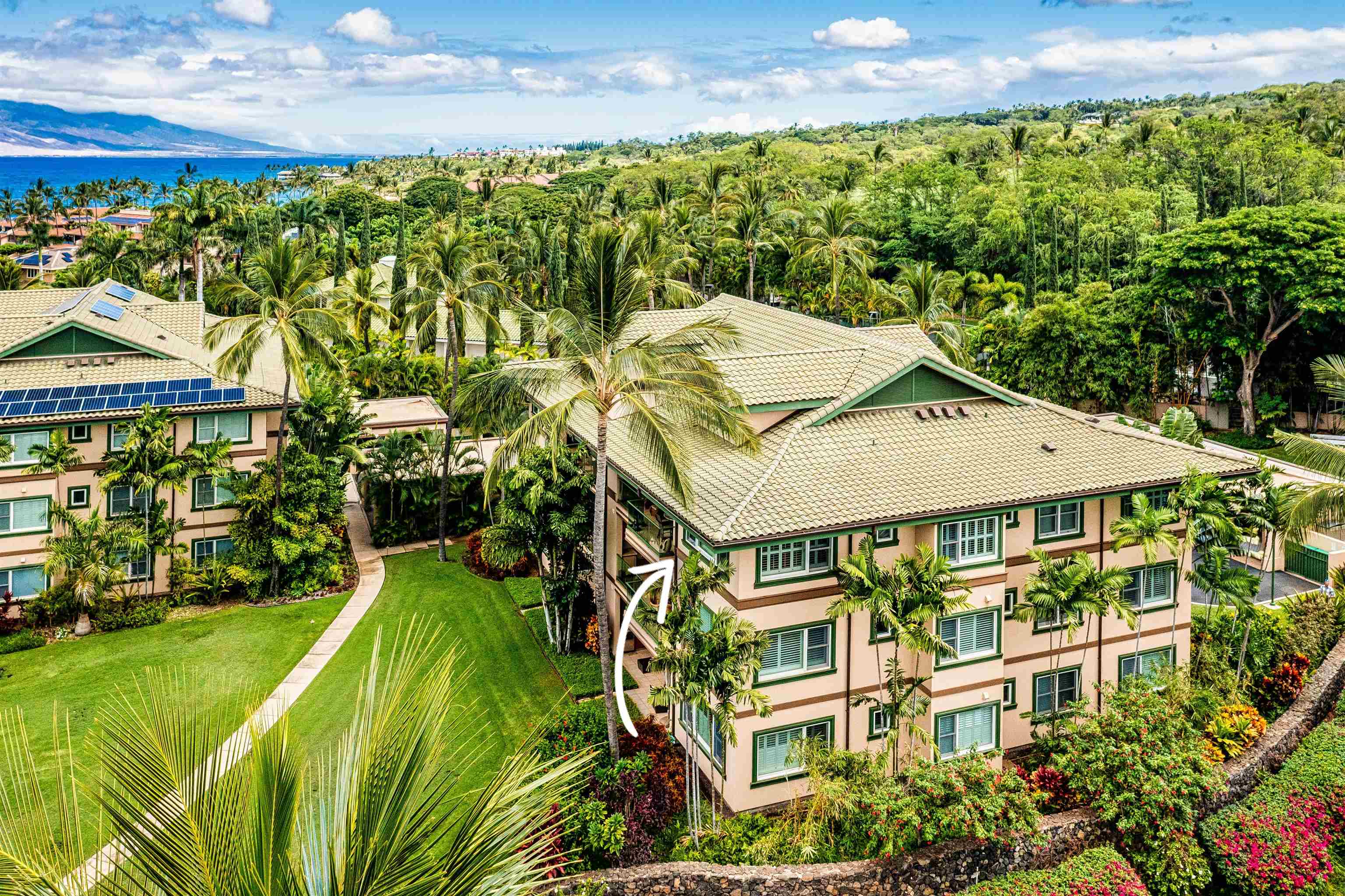 4955 Makena Road, Unit E301 Kihei, HI 96753 - Photo 4 of 22 a view of a big yard with an outdoor space