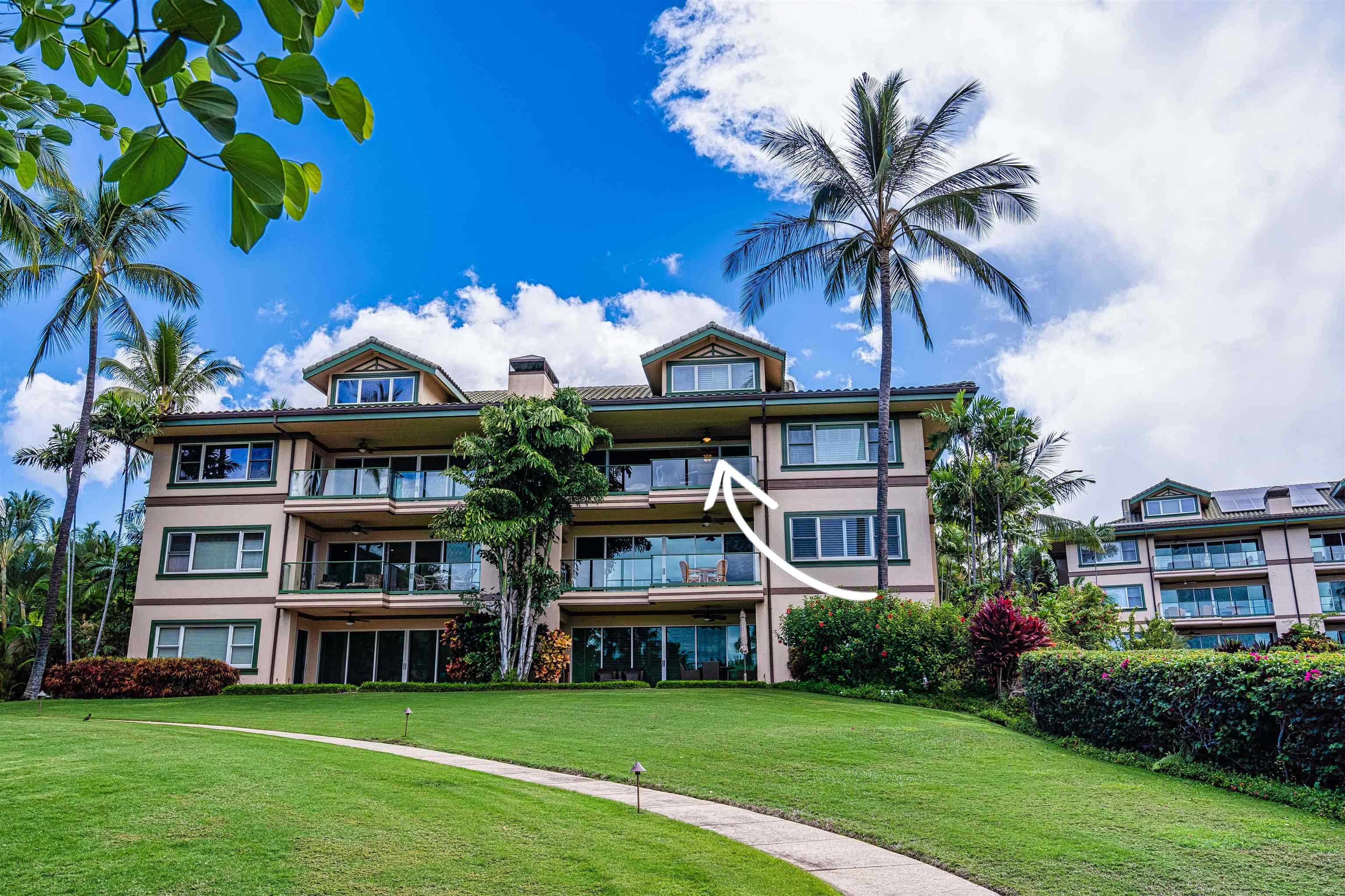 4955 Makena Road, Unit E301 Kihei, HI 96753 - Photo 5 of 22 a front view of a house with garden