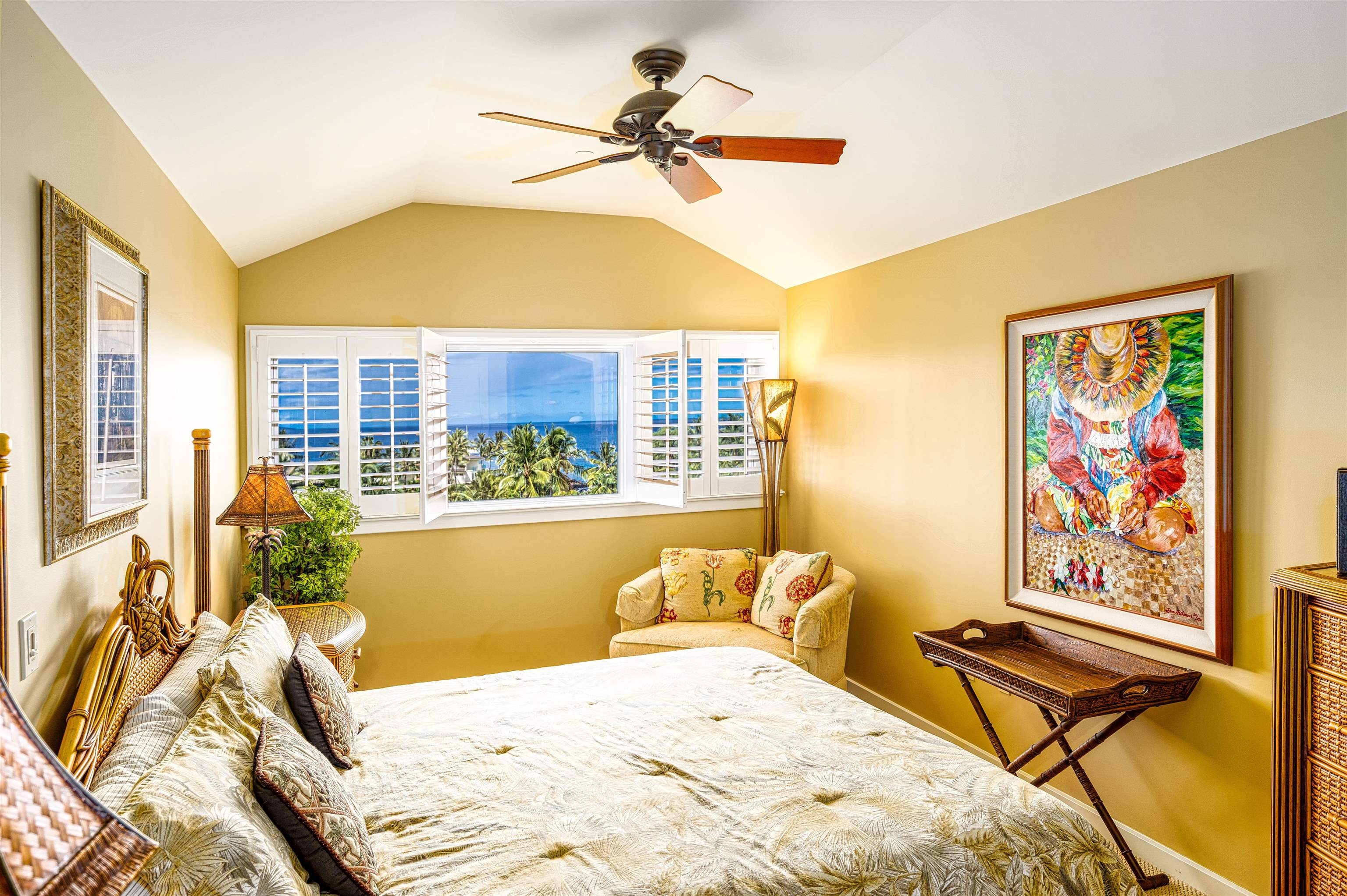 4955 Makena Road, Unit E301 Kihei, HI 96753 - Photo 7 of 22 a bedroom with a bed and a chandelier