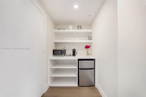 a utility room with washer and dryer