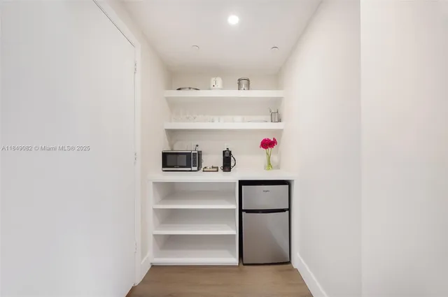 a utility room with washer and dryer