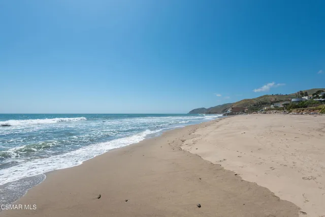 a view of beach and ocean