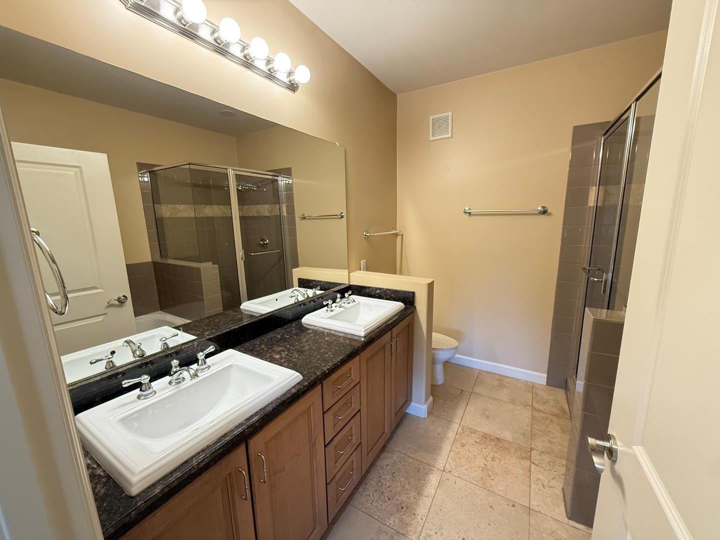 7291 North Scottsdale Road, Unit 3003 Paradise Valley, AZ 85253 - Photo 18 of 45 a bathroom with a sink and a mirror