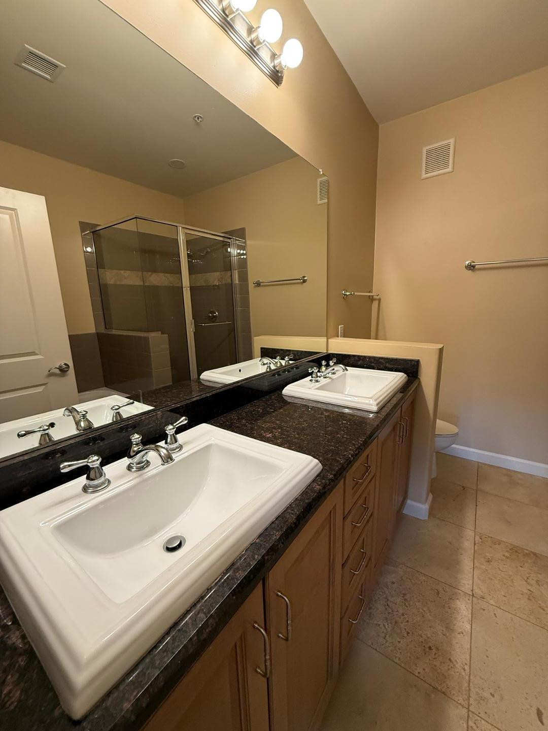 7291 North Scottsdale Road, Unit 3003 Paradise Valley, AZ 85253 - Photo 23 of 45 a bathroom with a sink and a mirror