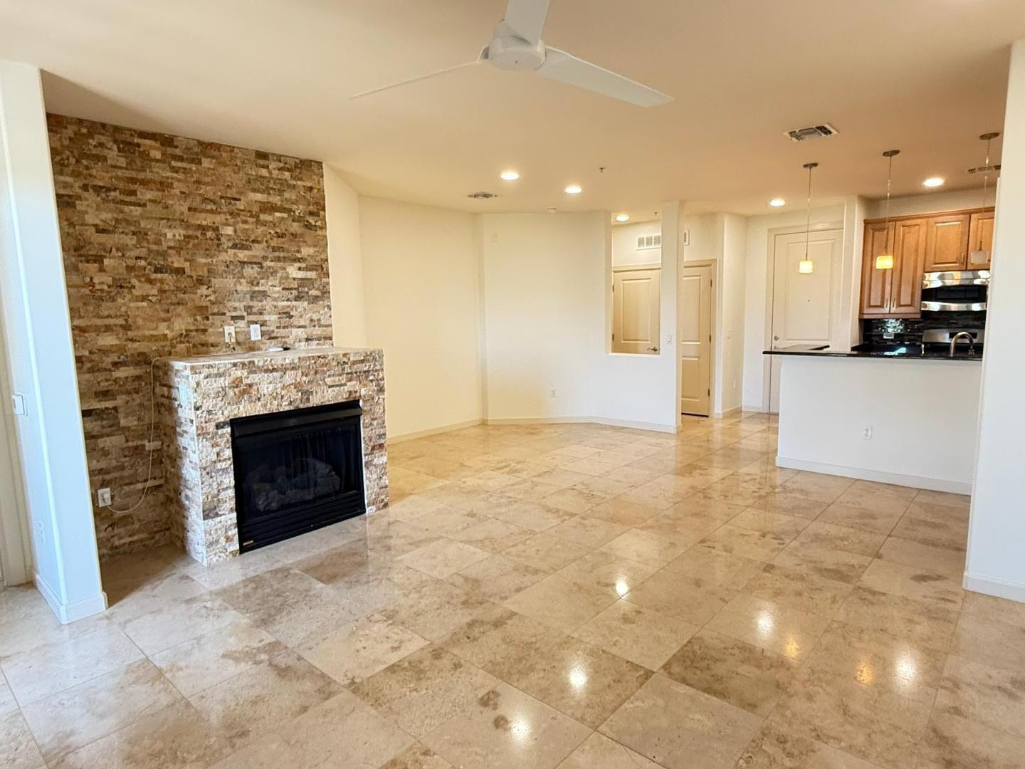 7291 North Scottsdale Road, Unit 3003 Paradise Valley, AZ 85253 - Photo 25 of 45 a view of a kitchen with a sink and a fireplace