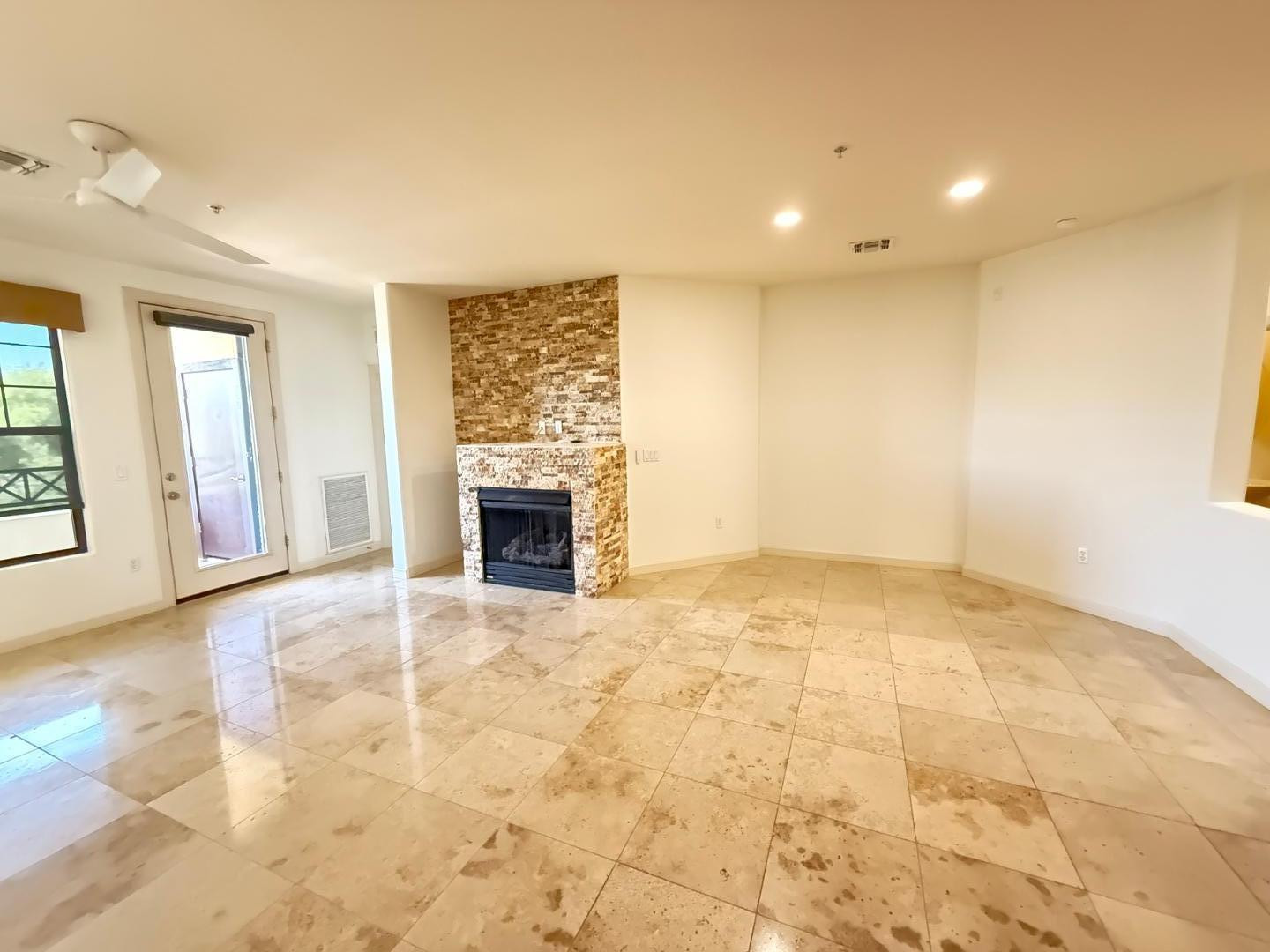 7291 North Scottsdale Road, Unit 3003 Paradise Valley, AZ 85253 - Photo 8 of 45 a view of empty room with a fireplace