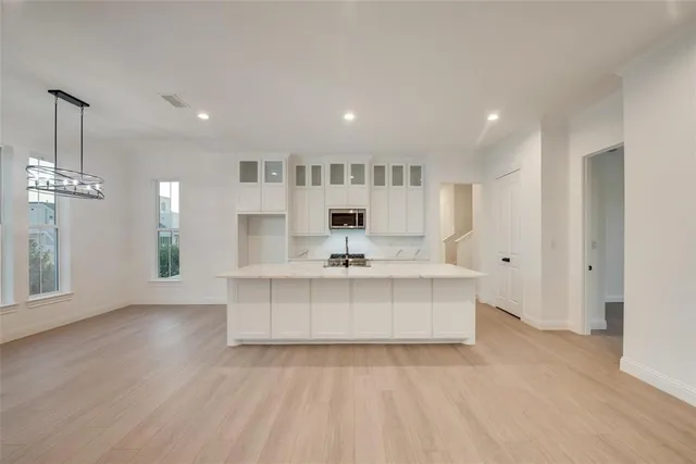 a view of living room with granite countertop furniture and fireplace