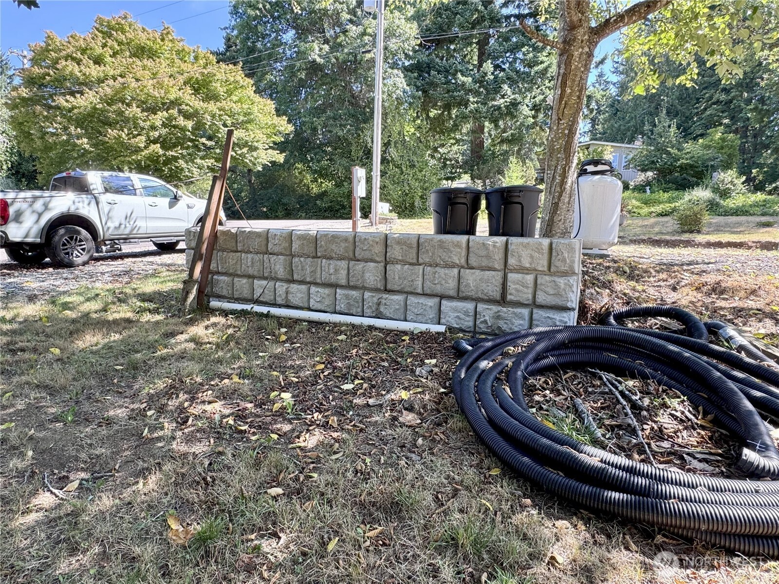 0 175th Avenue Southwest Longbranch, WA 98351 - Photo 11 of 19 a view of a house with a back yard