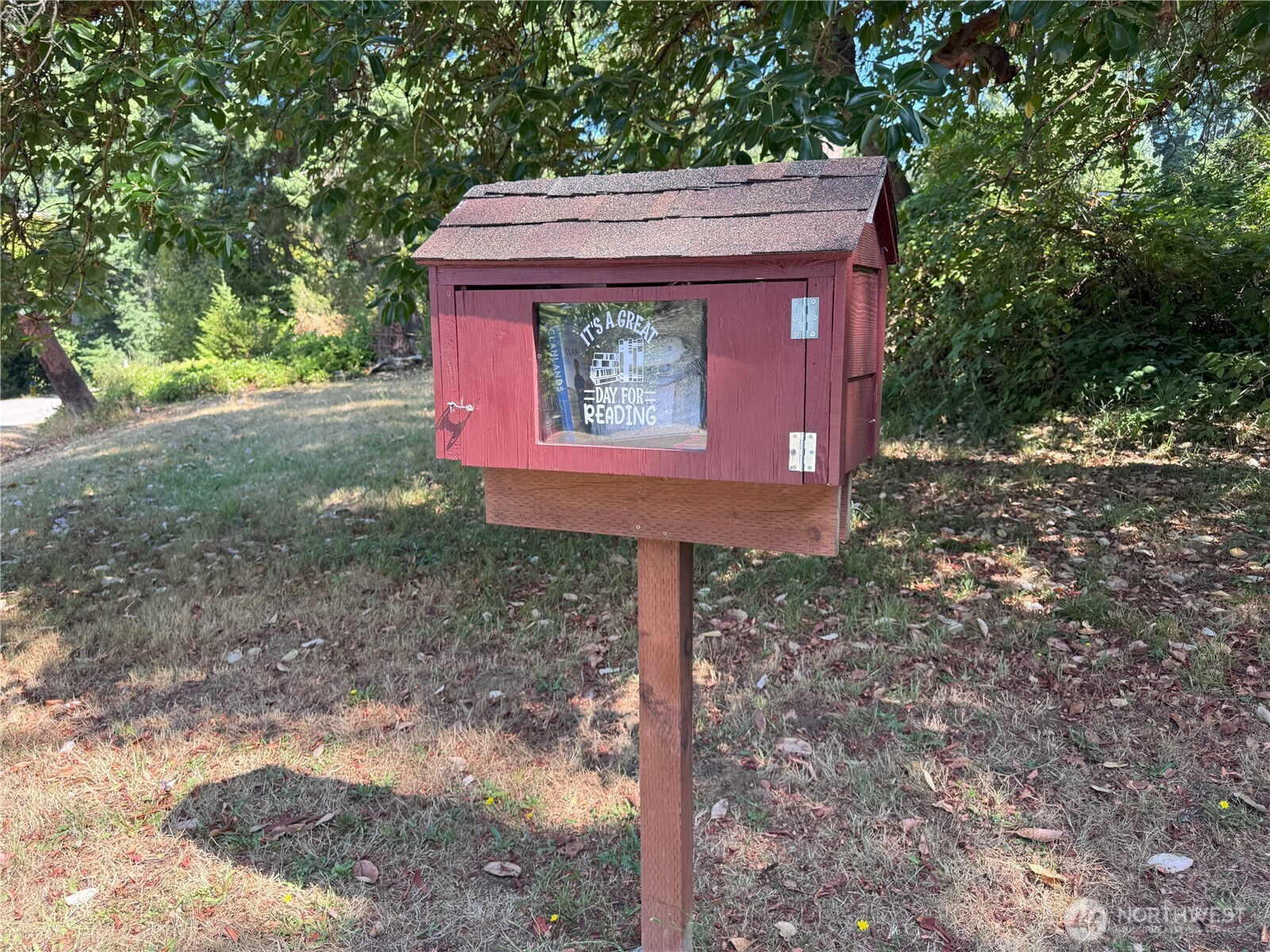 0 175th Avenue Southwest Longbranch, WA 98351 - Photo 18 of 19 a front view of a house with a yard