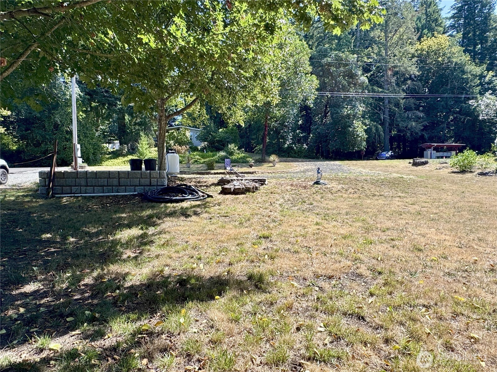 0 175th Avenue Southwest Longbranch, WA 98351 - Photo 5 of 19 a view of a yard with trees