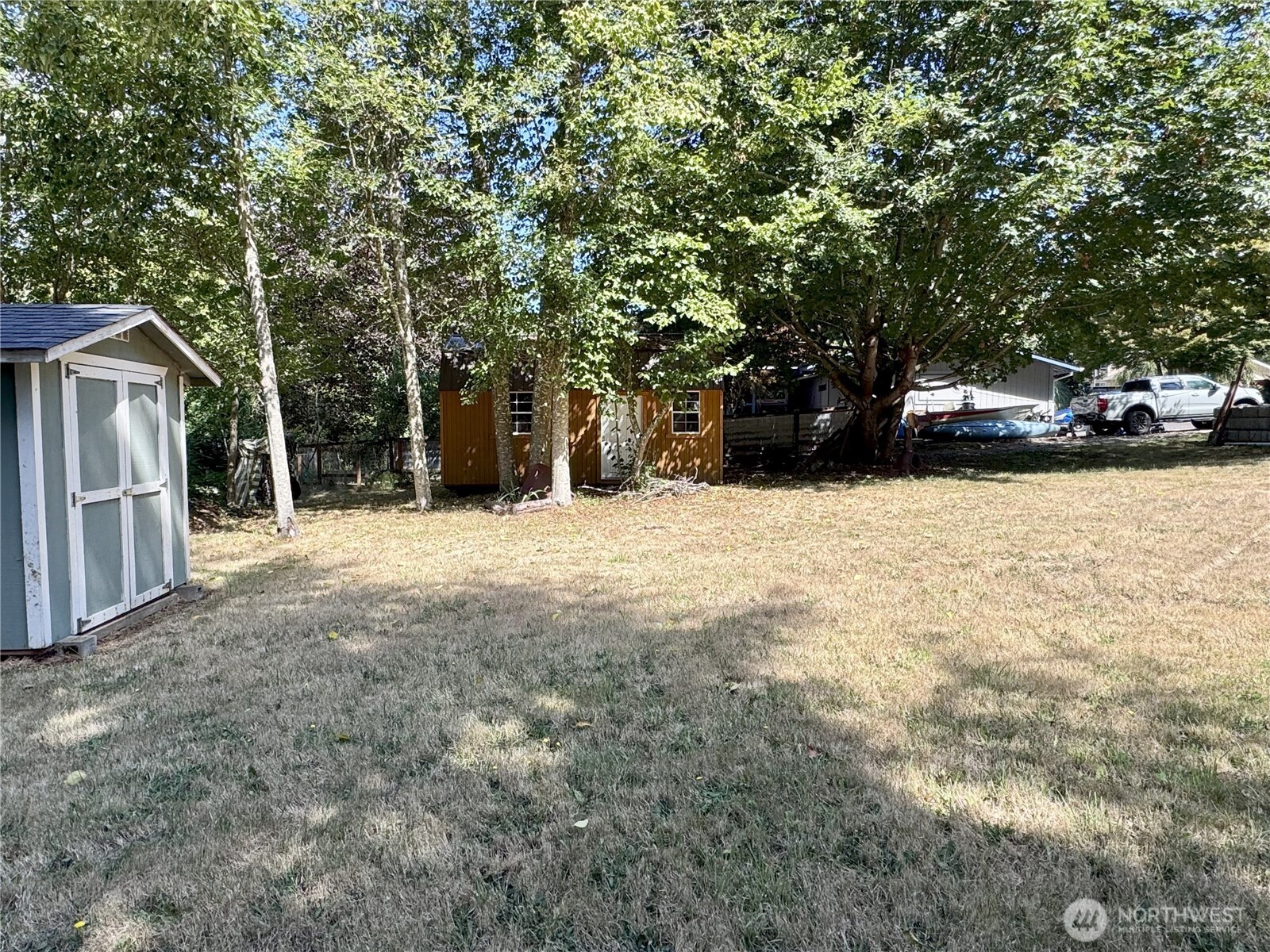 0 175th Avenue Southwest Longbranch, WA 98351 - Photo 9 of 19 a backyard of a house with lots of green space