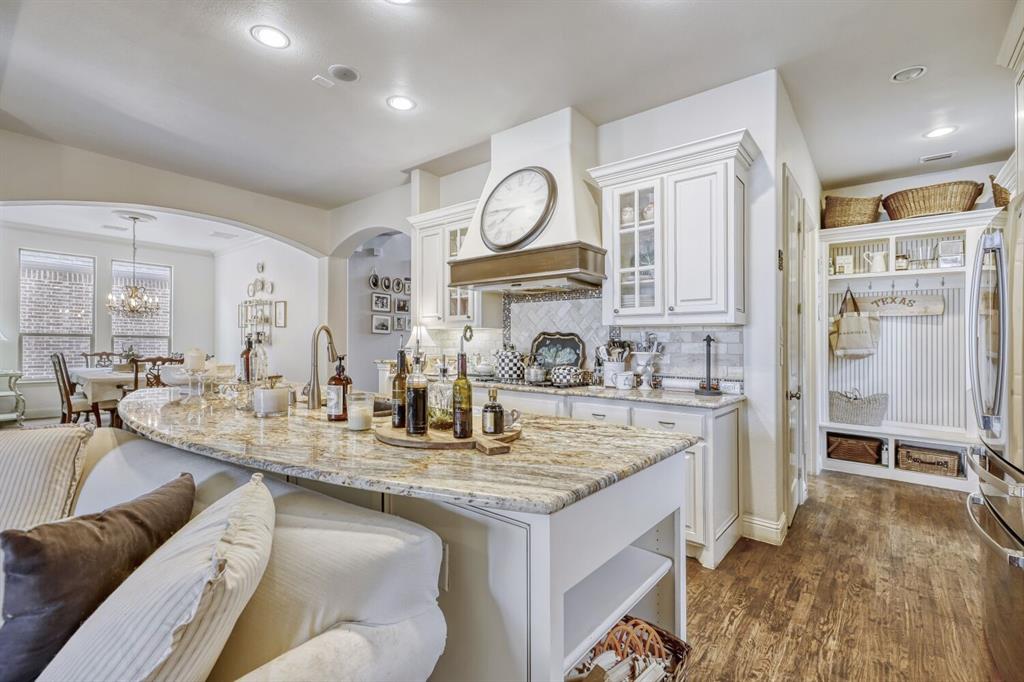 1425 Wildrye Ridge Celina, TX 75009 - Photo 12 of 32 a view of living room with granite countertop furniture and fireplace