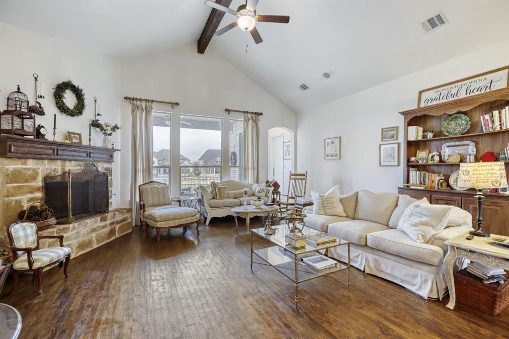 1425 Wildrye Ridge Celina, TX 75009 - Photo 14 of 32 a living room with furniture and a fireplace